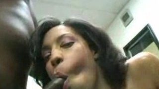 Ebony hairdresser blows her customer