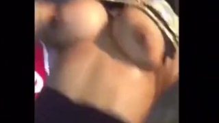 Cardi B flashes nice tits for fans