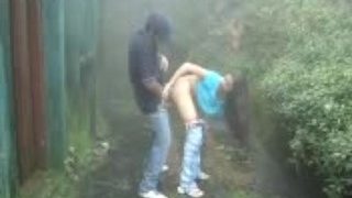 indian Lovers making-out in rain outdoor