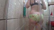 MILF at an early pregnancy, washed in the shower. hidden camera, peeping